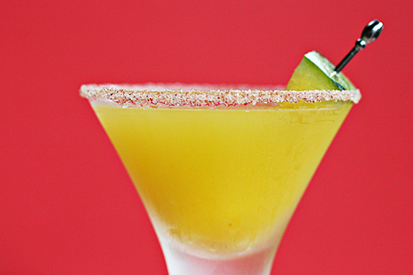 Yellow watermelon margarita with chipotle rim