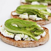 Bruschetta with fresh goat cheese, shaved asparagus and chive-infused oil