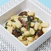 Potato-Parmesan gnocchi with morels and asparagus