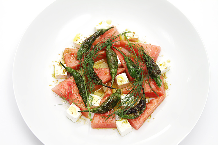 Watermelon salad with pan-roasted shishito peppers and feta